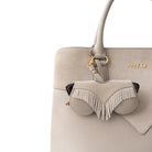 ANYDI_TaupeFringesSunCover_Tragevariante_900x900_Taschen5_1800x1800_fe8275ea_87f4_48a6_8730_41da1755f7ed.jpg